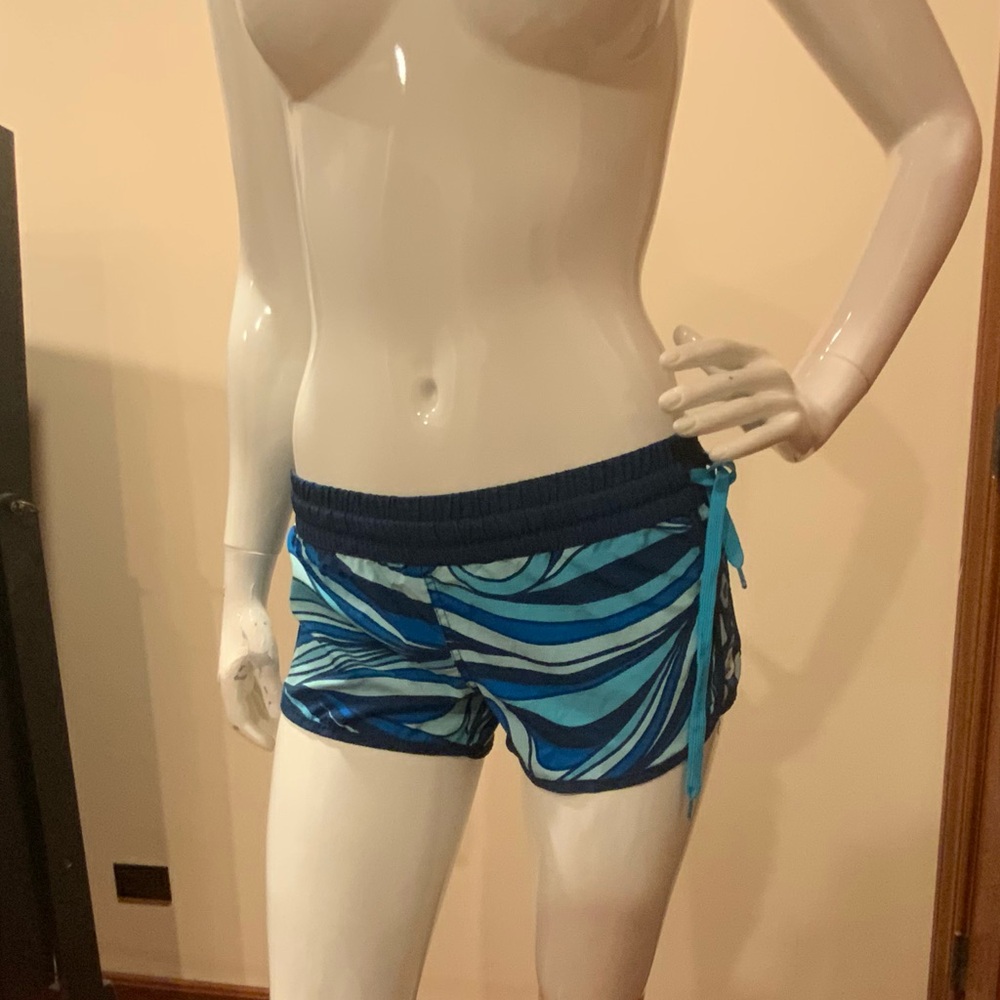 Frutiger areo and metro swim shorts